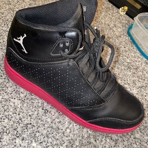 Black and hot pink Jordan’s